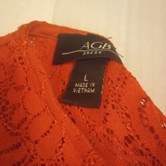 - AGB orange sleeveless high low dress with tassel belt and ruffle accents - Picture 4 of 12